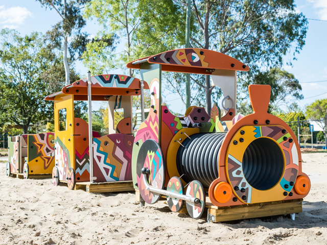 Railway-themed playground art